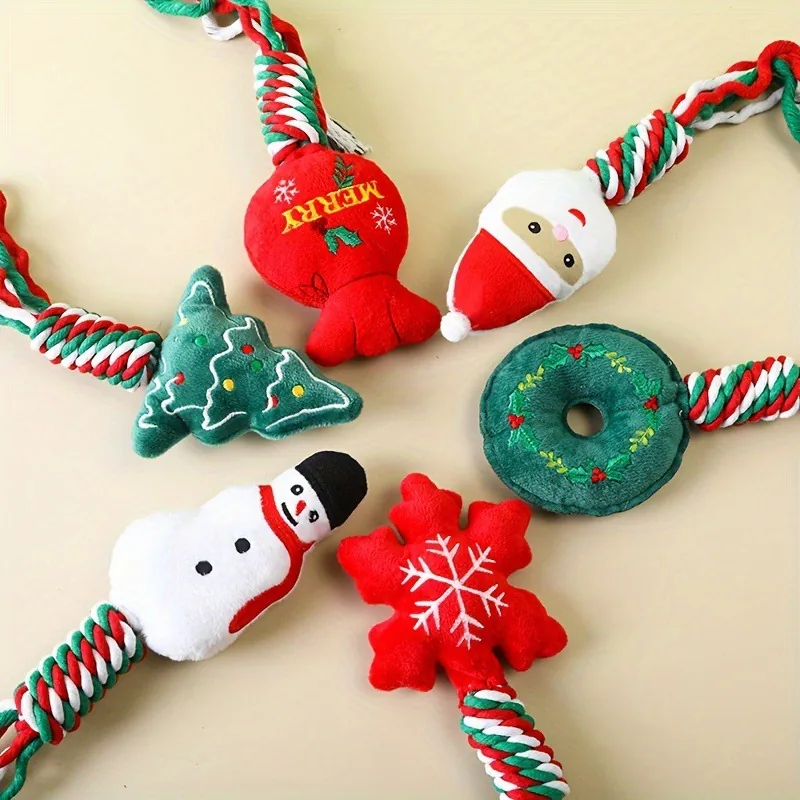 Close-up of the six embroidered plush heads with their twisted rope necks