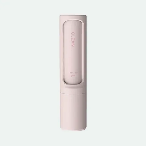 Pink handheld reusable pet hair remover