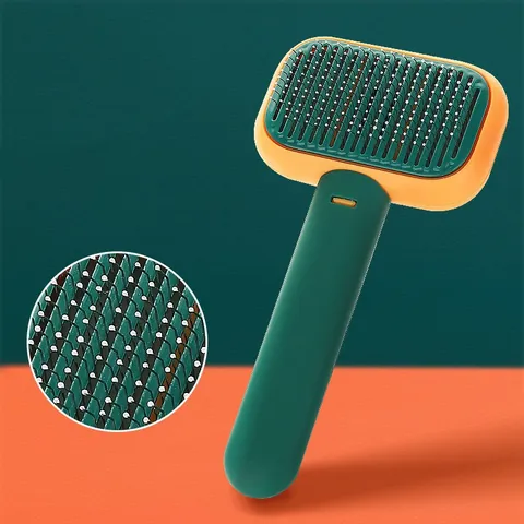 Green and orange self-cleaning slicker brush with fine metal pins