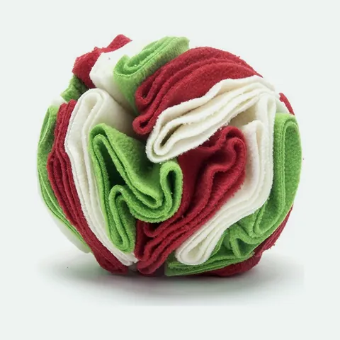 Round snuffle ball made of layered red, white and green fleece frills